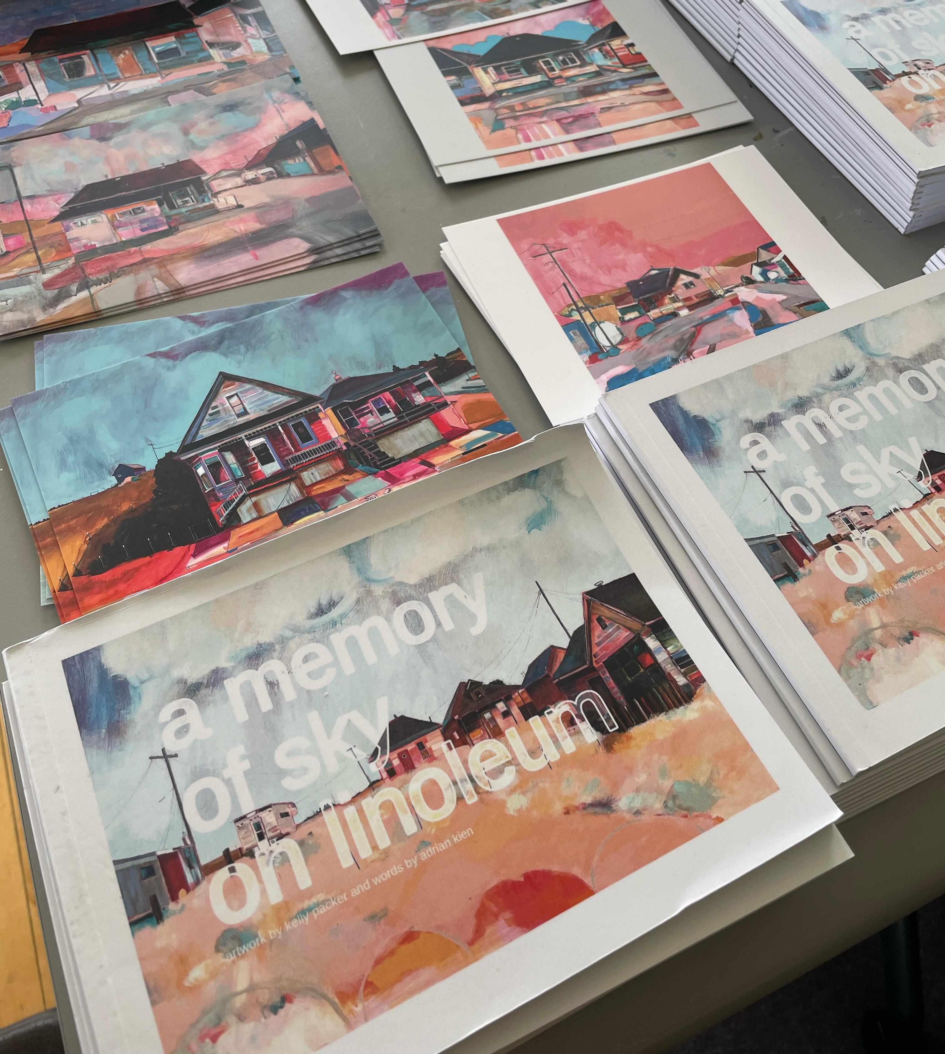 Postcards and books - a memory of sky on linoleum